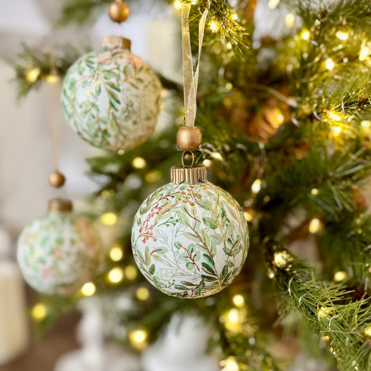 Decorative Christmas tree with ornaments and lights in a home setting