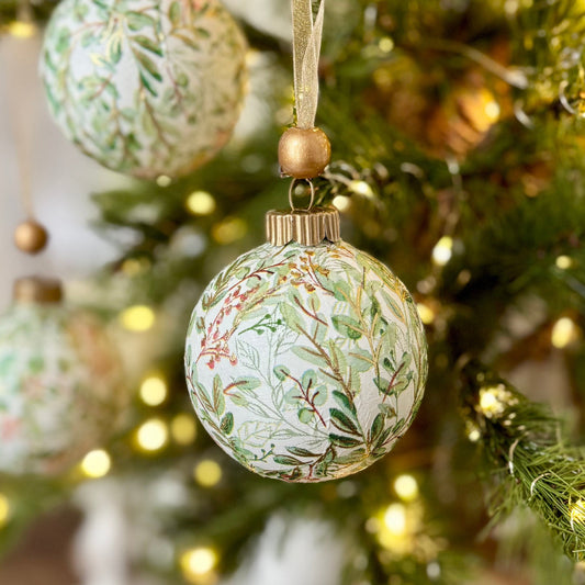Decorative Christmas tree with ornaments and lights in a home setting
