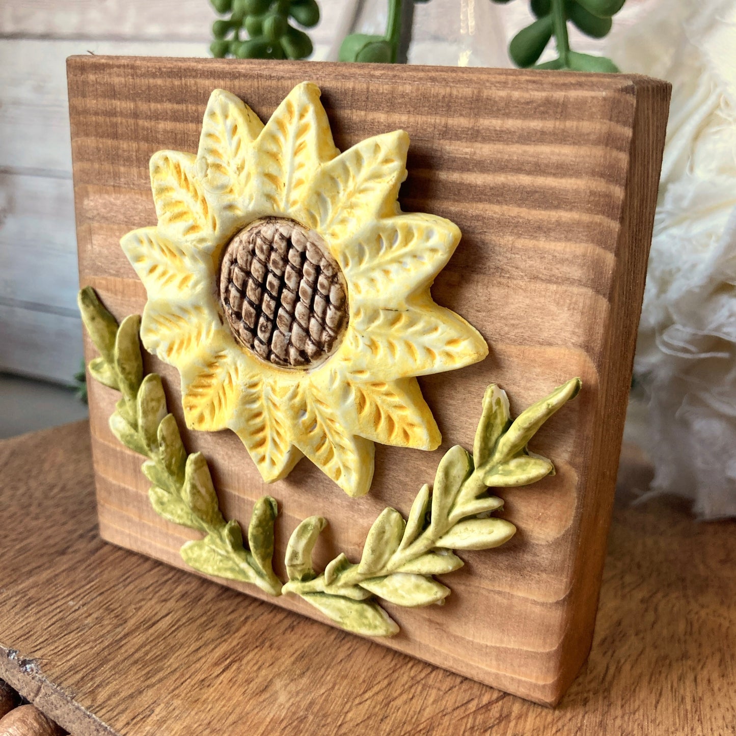 side view of the sunflower sign on a wooden block. Mini in size, approximately 3.5 inch square.