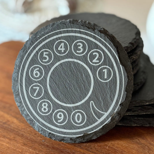 Black slate coaster with a rotary phone design